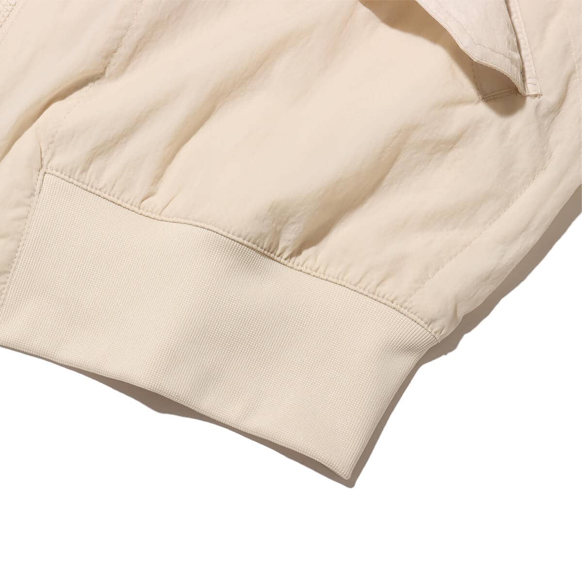 JORDAN BRAND AS M J ESS STMT LTWT RNGD JKT LEGEND LT BROWN の画像