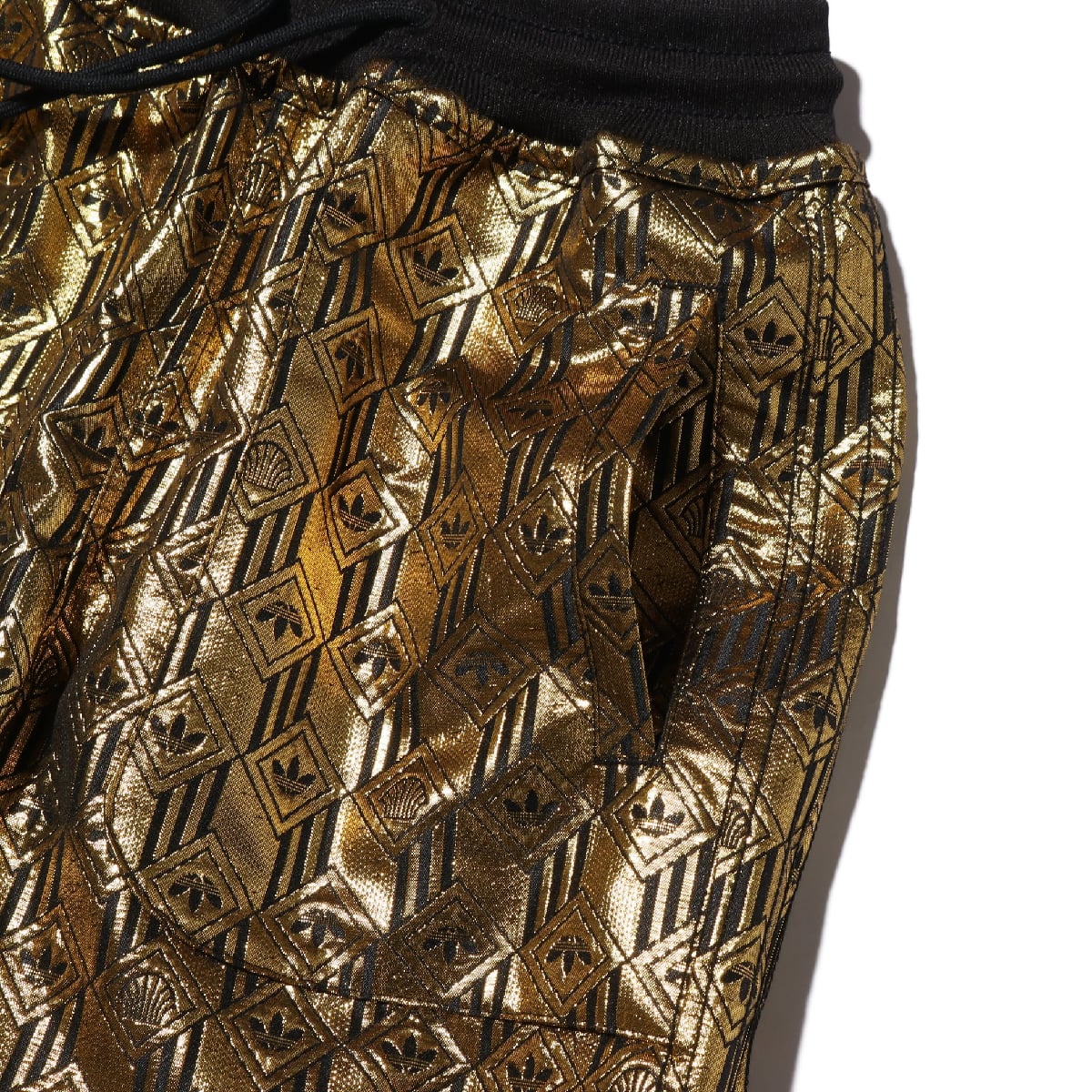 adidas track pants gold