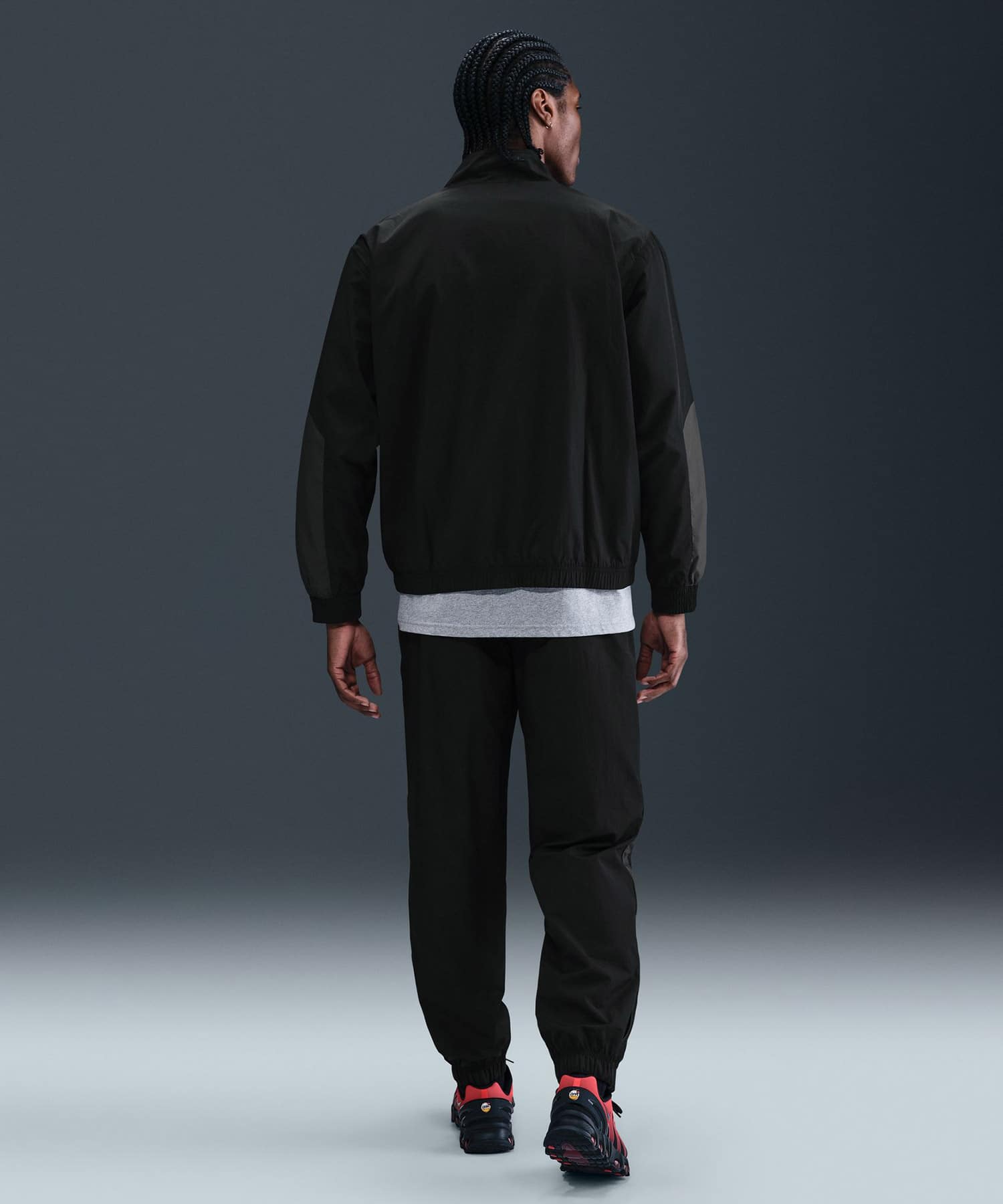 NIKE M NSW TN TRACKTOP WVN BLACK/DK SMOKE GREY/UNIVERSITY REDの画像