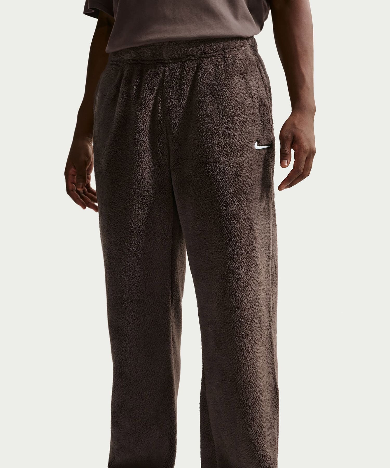 NIKE AS M NRG NOCTA CS PANT FL CM BAROQUE BROWN/SUMMIT WHITEの画像