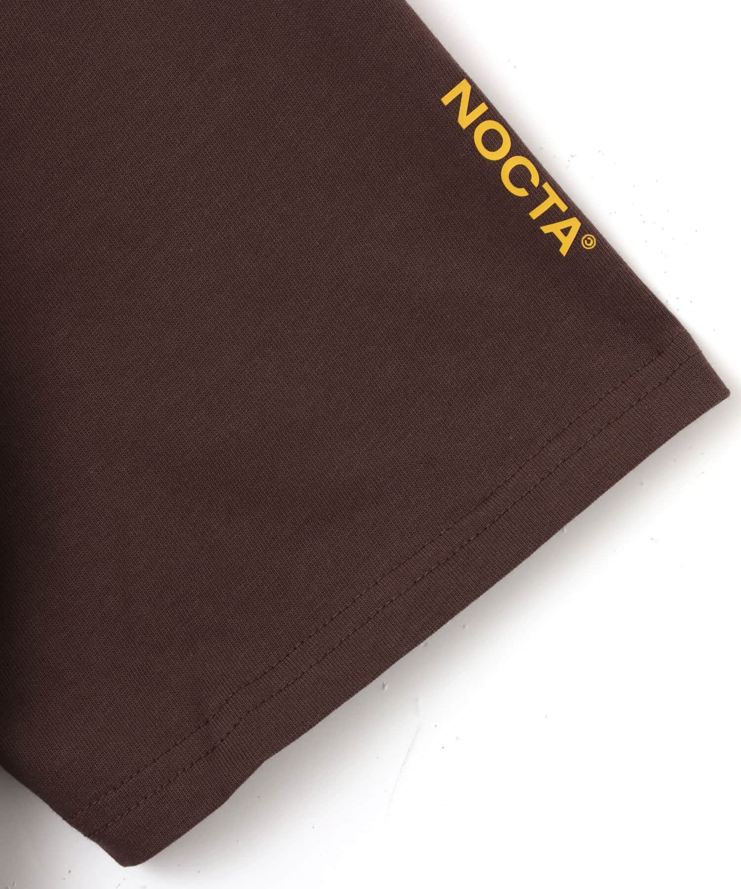 NIKE AS M NRG NOCTA CS TEE SS BAROQUE BROWN/YELLOW OCHREの画像