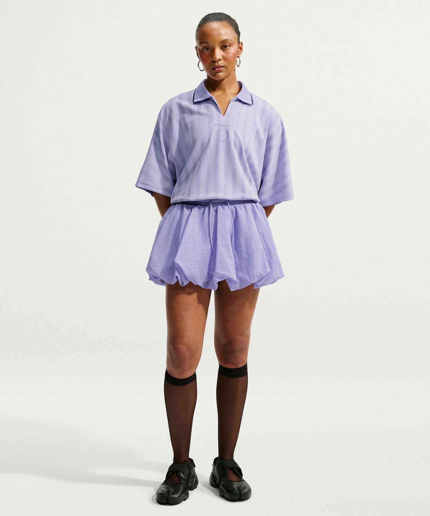NIKE W RNWY JERSEY TOP PURPLEの画像