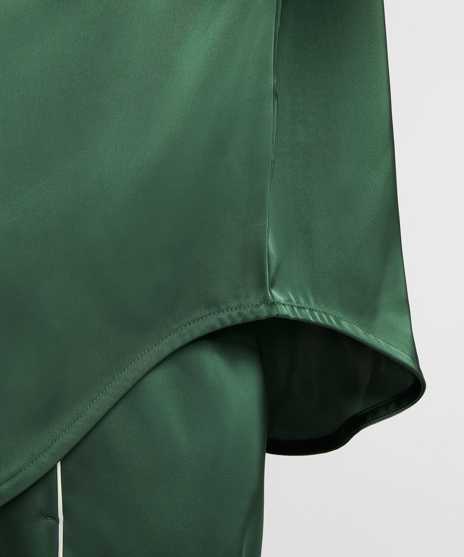 NIKE AS W NSW OFFLN WVN STN LS TOP GREENの画像