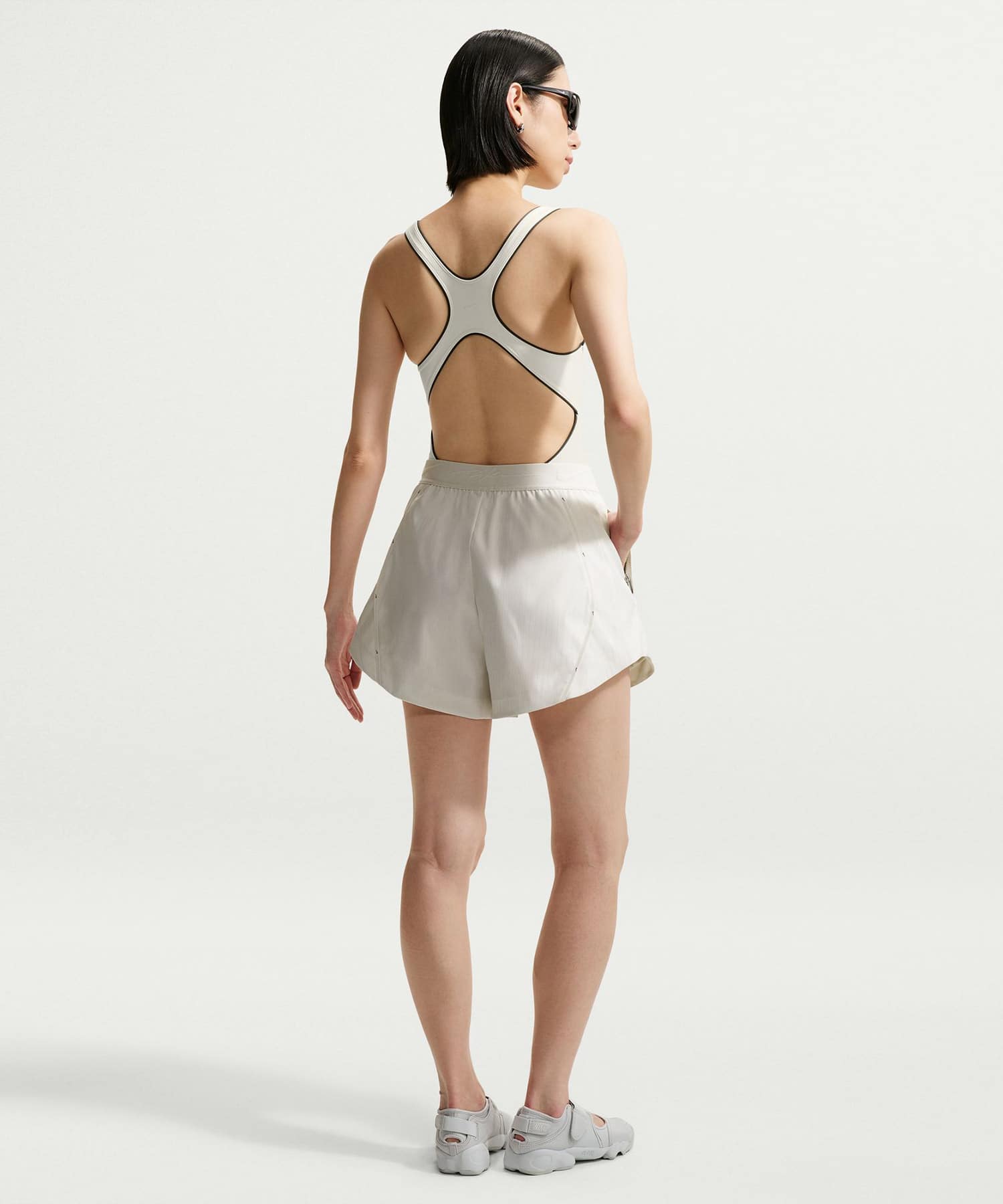 NIKE W NRG NK BODYSUIT OFFWHITEの画像