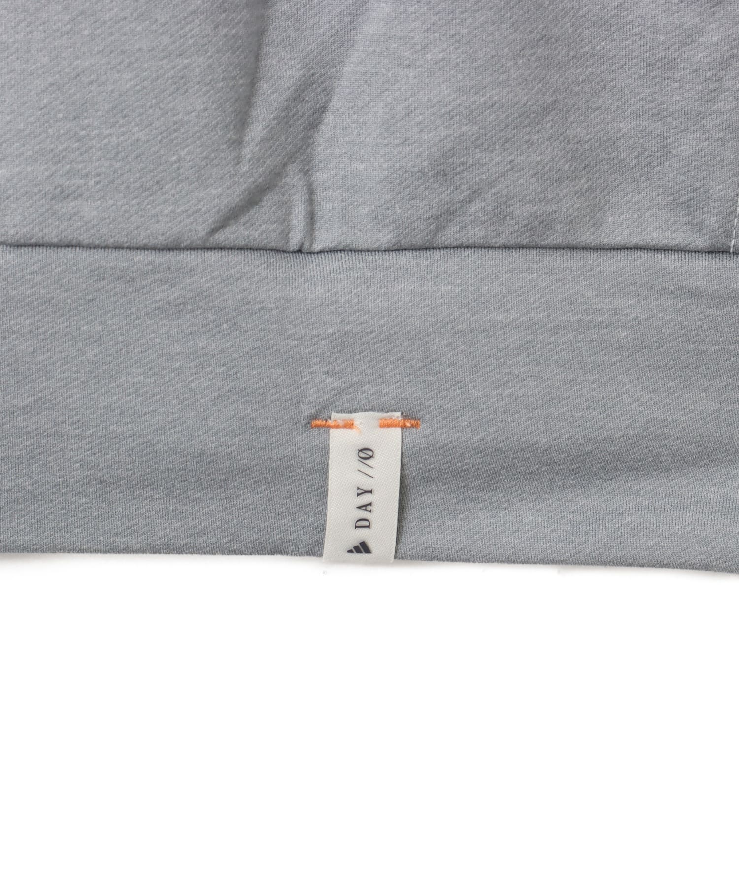 adidas DAY//Ø SWEAT HOODIE U ミディアムグレーヘザーの画像