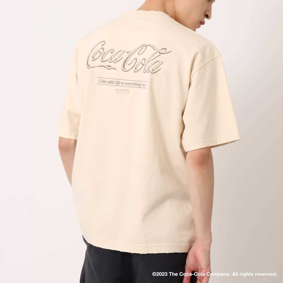 Coca Cola | atmos Metallic Logo T-shirts IVORYの画像