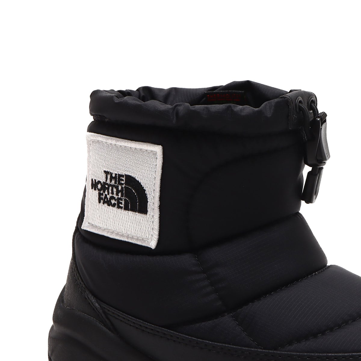 THE NORTH FACE KIDS NUPTSE BOOTIE LOGO SHORT TNFブラック×TNFホワイトの画像
