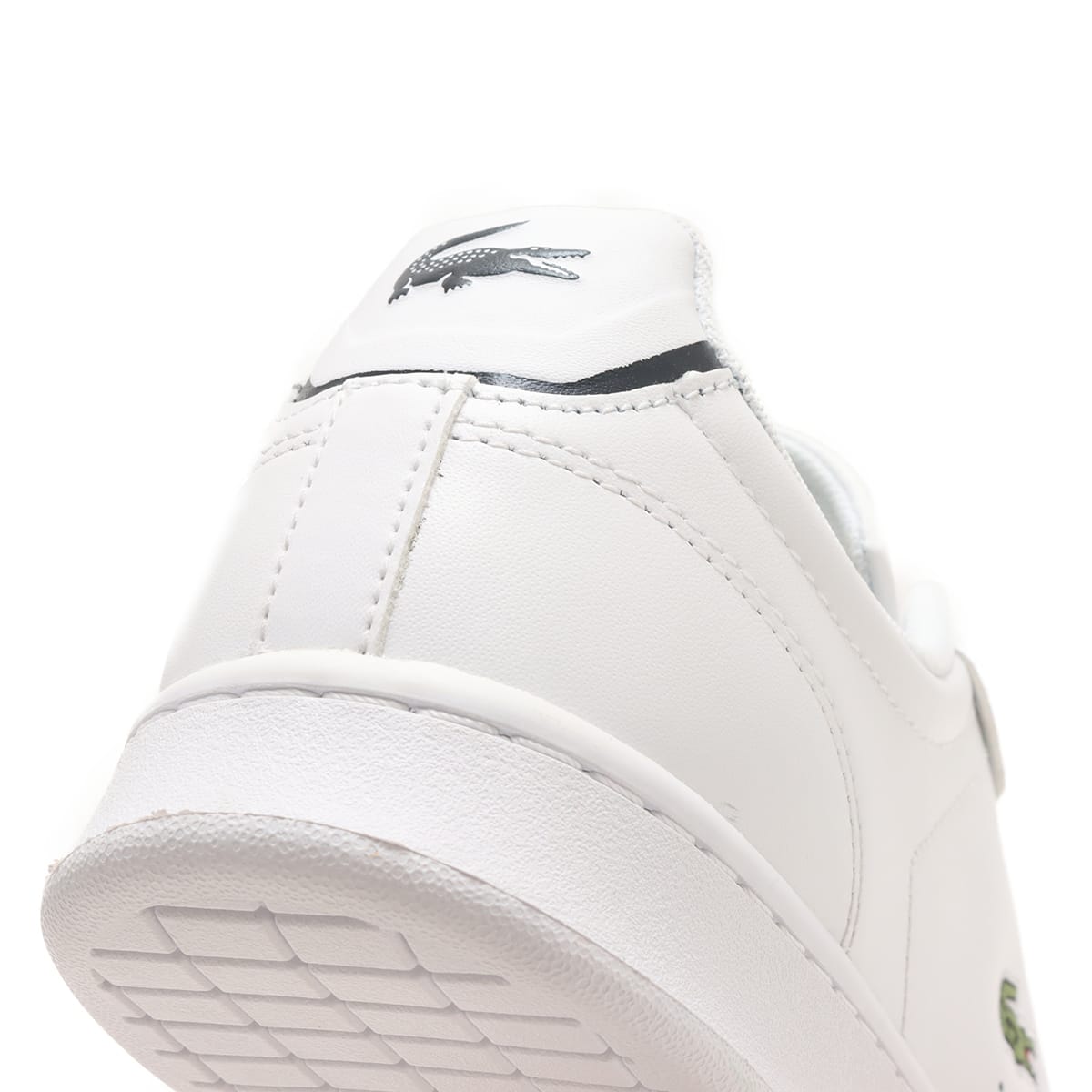 LACOSTE CARNABY PRO BL23 1 SMA WHT/NVY 23FA-I