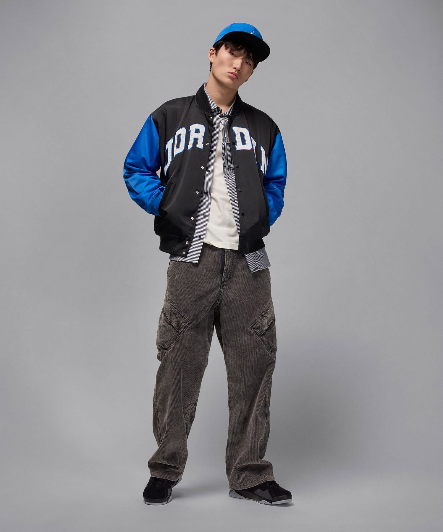 JORDAN BRAND M J BRK CLGTE VRSTY JKT BLACK/SPORT BLUE/BLACKの画像