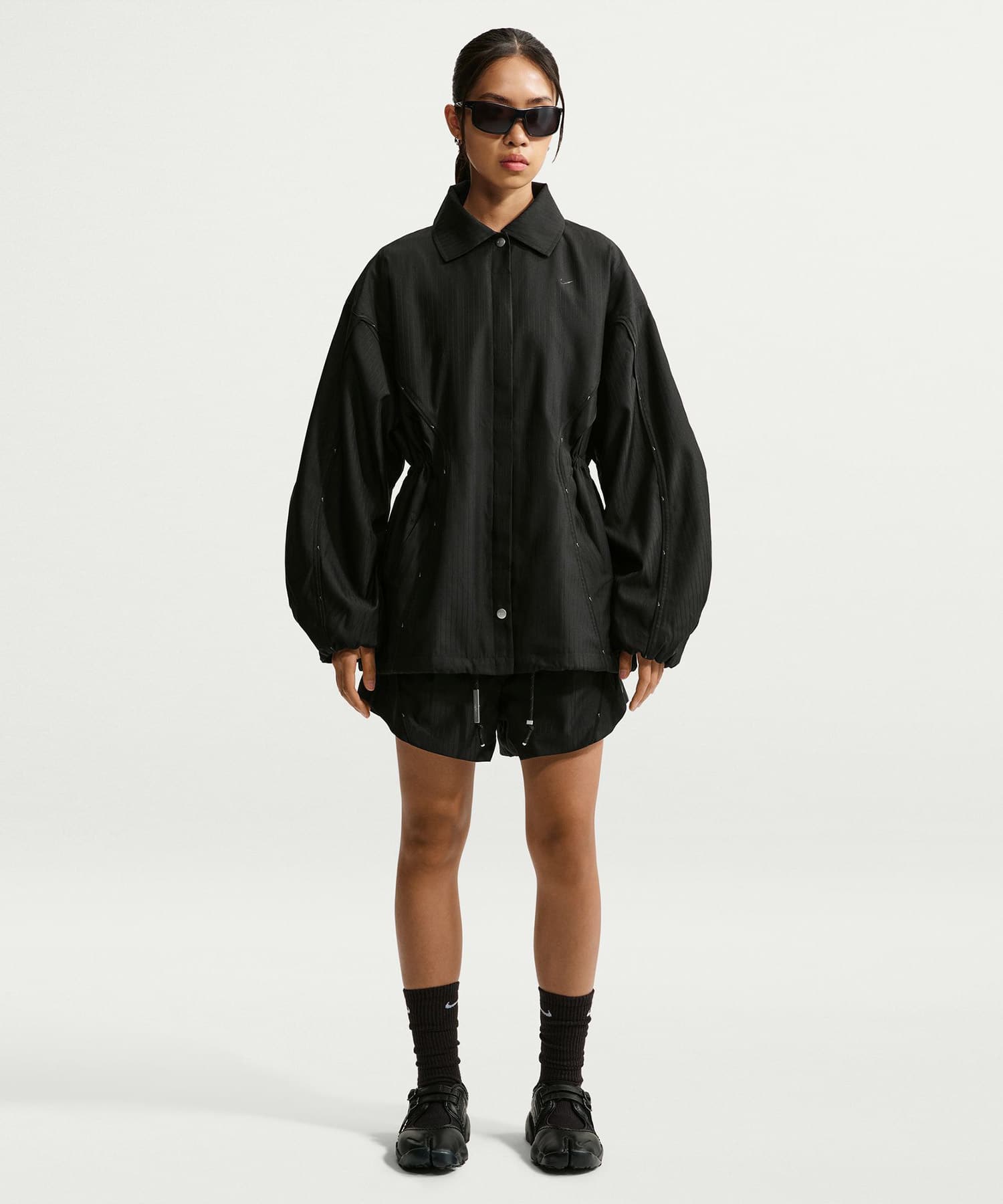 NIKE W NRG NK DF COACHES JACKET BLACKの画像