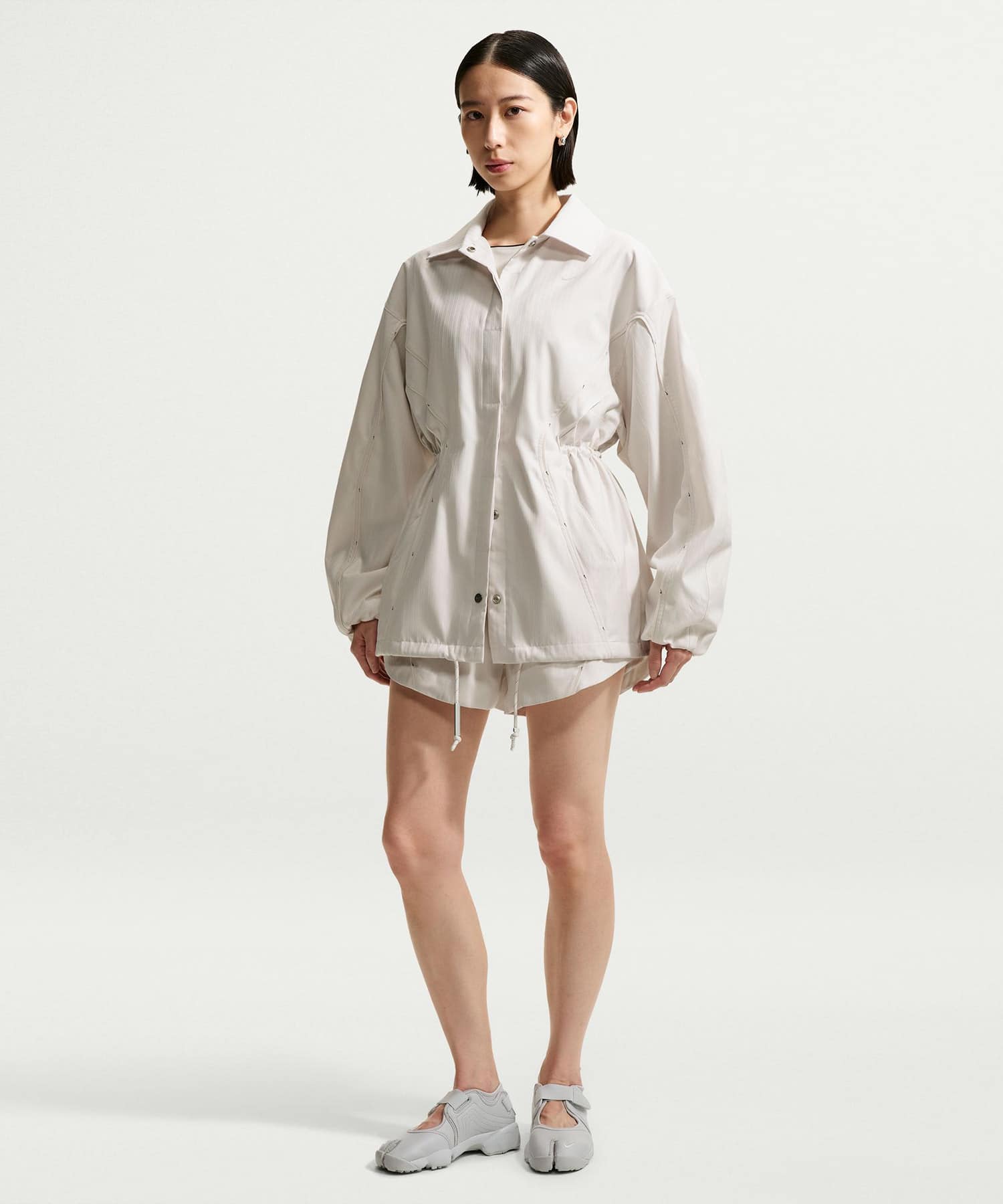 NIKE W NRG NK DF COACHES JACKET OFFWHITEの画像