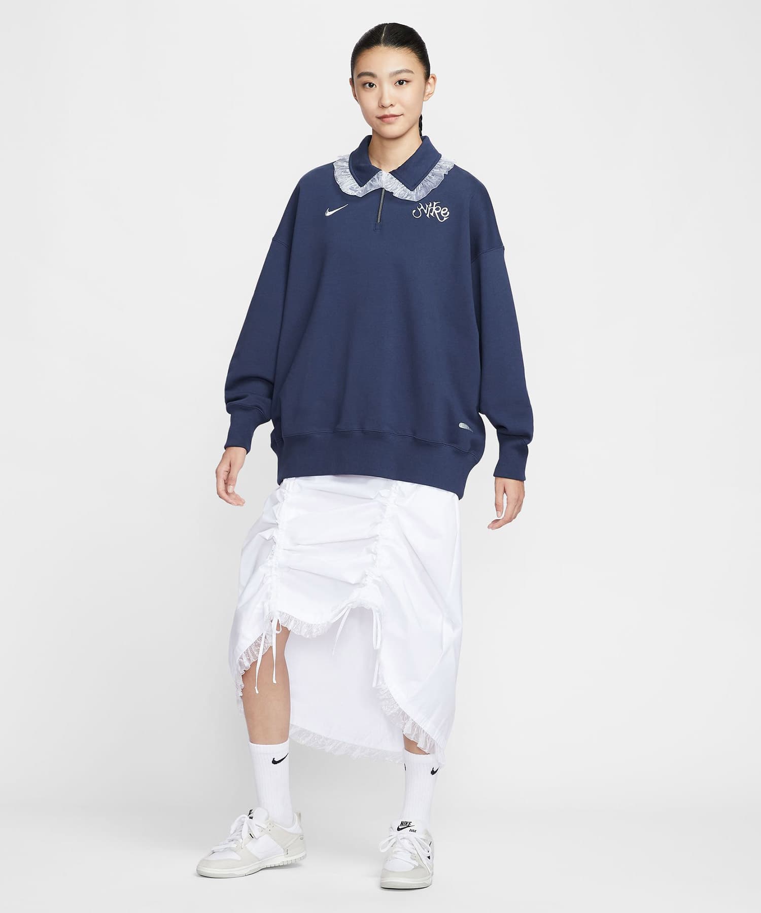 NIKE AS W NSW FLC OS BLKT QZ POLO G MIDNIGHT NAVYの画像
