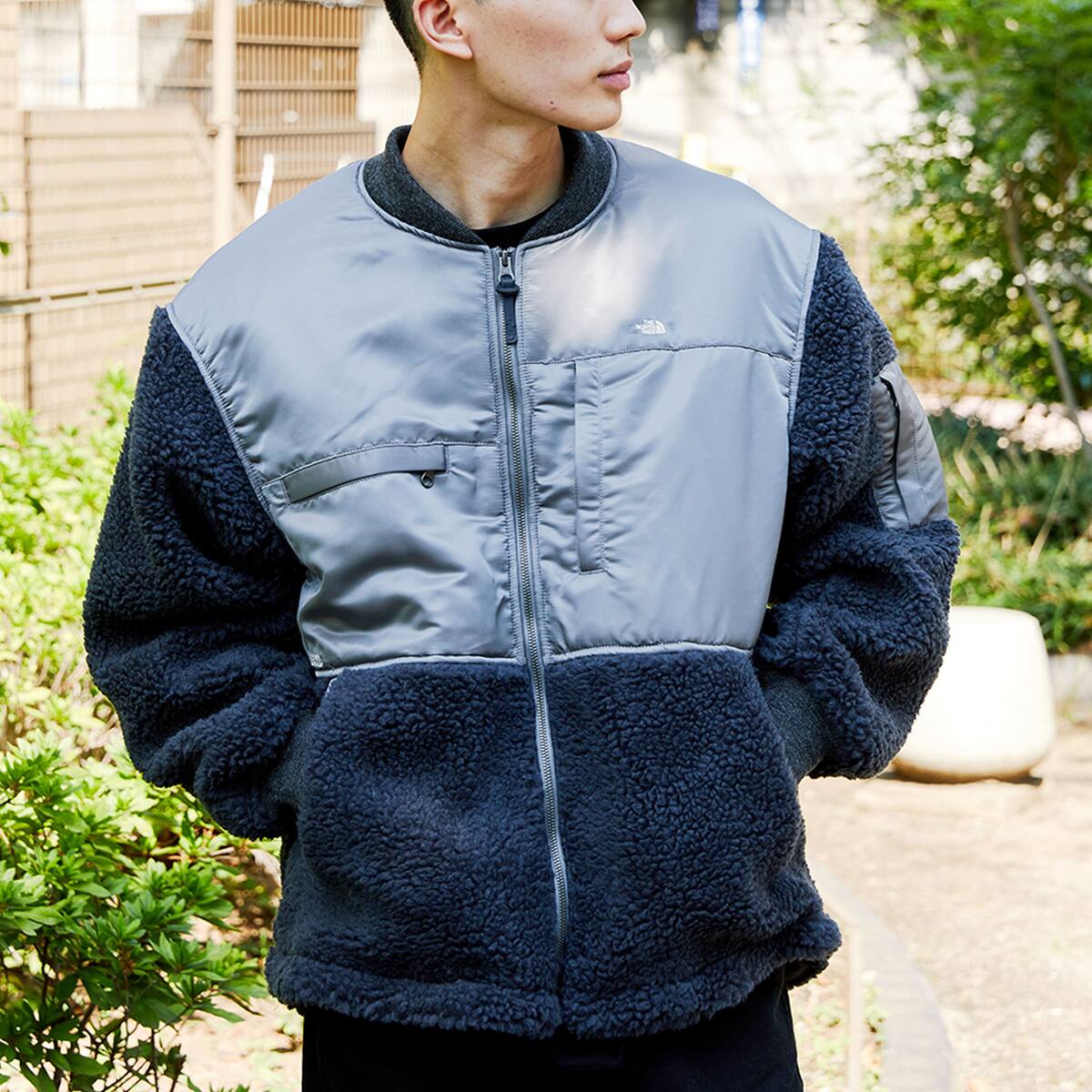 grey and purple north face jacket