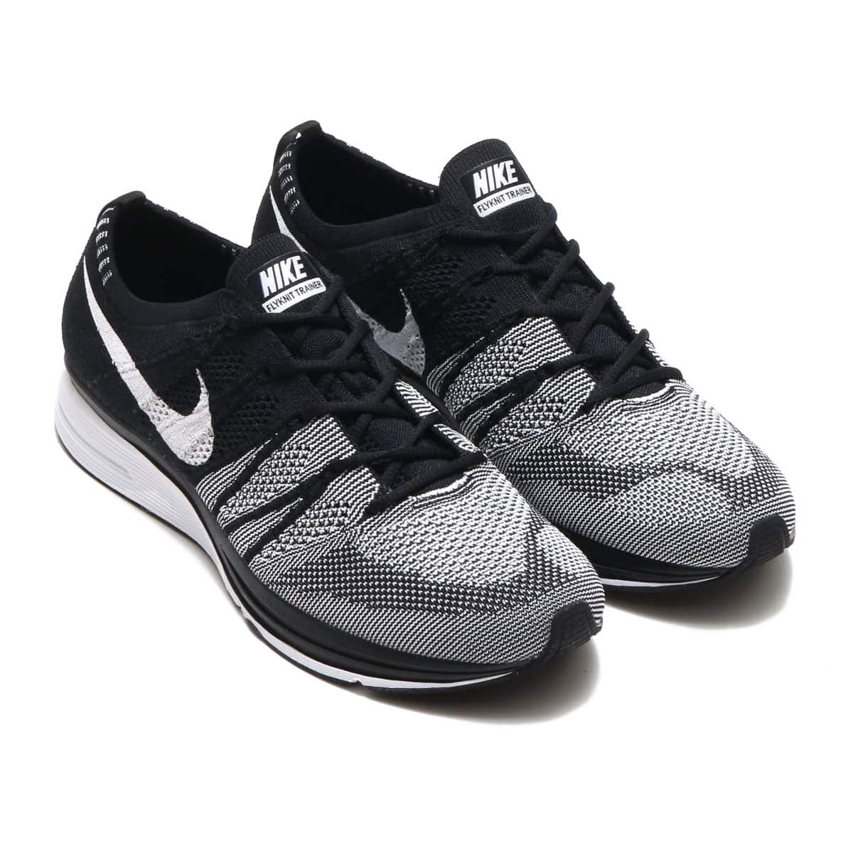 flyknit trainer black and white